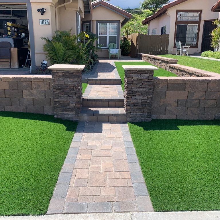 Inviting stone pathways and paver walkways that guide guests through your property.
